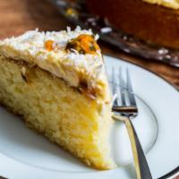 Coconut Passion Fruit Aurora · Fresh white cake with coconut cream, diced pineapples in rum with mango passion fruit and st...