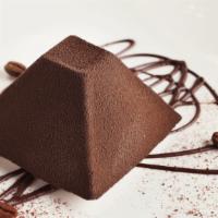 Chocolate Pyramid · Chocolate cake with a rich dark chocolate mousse and a surprise raspberry cream center glaze...