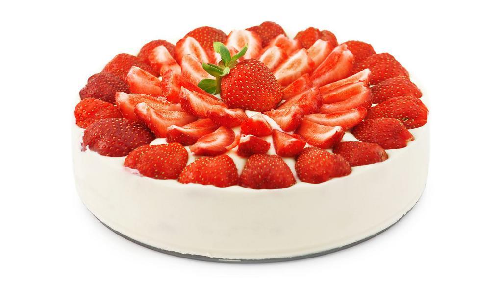Strawberry Bagatelle · Fresh white cake with slices of fresh strawberries in vanilla cream filling. Garnished with half a strawberry.