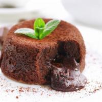 Molten Cake · Fresh dense chocolate cake with soft cream center when warmed for delivery.