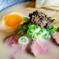 Traditional Paitan · Beef bone broth cooked with kelp, shaved bonito, mushrooms, topped with beef filet, oyster m...