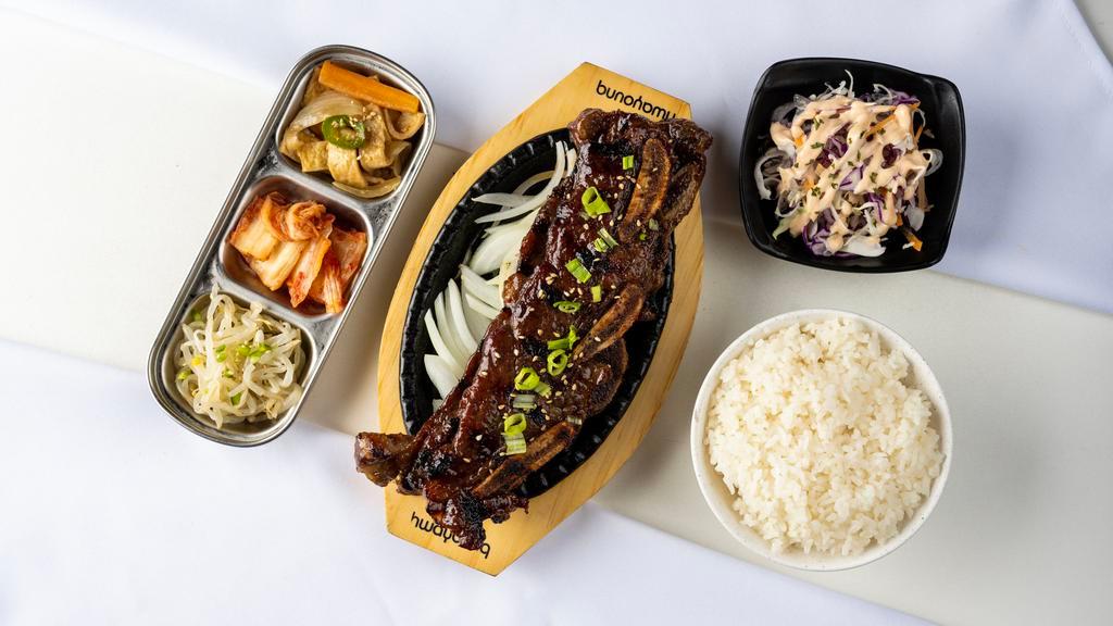 Galbi Short Rib · Grilled beef short ribs marinated in house special sauce.