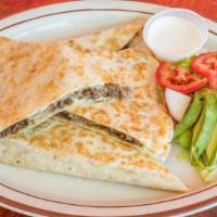 Quesadillas · Quesadillas have cheese and your choice of meat.