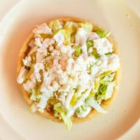 Sopes · Sopes are a thick tortilla with beans your choice of meat lettuce sour cream salsa and cheese.