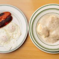 2. Breakfast · Two eggs, choice of meat, potatoes, and toast.