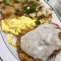 Chicken Fried Steak & Eggs · Chicken fried steak served with country-style gravy and two eggs. Includes potatoes and home...