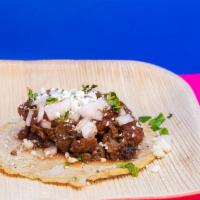 Barbacoa Taco · Beef cheek, mango pico, cojita, onion, cilantro. Gluten-Free | Mild Spice
