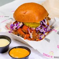Angry Bird Deluxe Sandwich · SPICY. Beer battered fried chicken, orange spicy adobo aioli sauce (bro sauce), white sweet ...