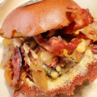 The Original Osito Burger · Flame grilled halal ground chuck, chipotle aioli, grilled onions, applewood smoked bacon, ja...