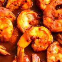 Camarones a la Diabla  · Camarones a la diabla / Shrimp in butter and chipotle hot sauce. All plates served with rice...