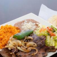 Carne Asada Plate / Roasted Beef Plate · carne de la parrilla. arroz, frijoles, tomates, lechuga, salsa y tortillas. / Grill beef. ri...