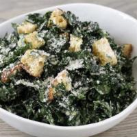 Kale Caesar · Baby Kale with organic acme sourdough croutons and grana padano cheese 
*add crispy or roast...