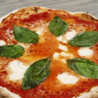 Margherita Pizza · Organic dough, house made tomato sauce, fresh buffalo mozzarella, fresh basil