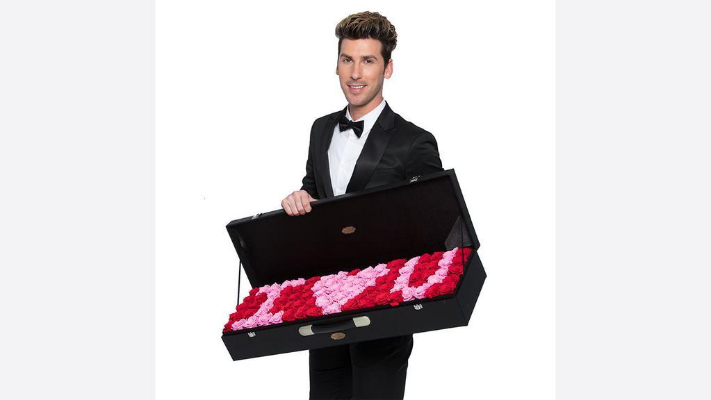 I Love You · Make an impression —  a really big one — with this huge box of red and pink preserved roses that say “I ❤ U” in the most charming way. The entire arrangement contains 90 to 100 roses, and is carefully tucked into a sturdy briefcase covered in faux leather. Imagine the look on your sweetie’s face when you open the lid to reveal this unforgettable message spelled out so beautifully.