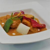 CHICKEN TIKKA MASALA · Boneless pieces of chicken Tikka cooked in rich tomato sauce and sweetened by honey and topp...