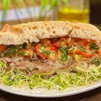 Pesto Beef Sandwich · Ciabatta bread, mozzarella cheese, beef, tomatoes, pesto sauce.