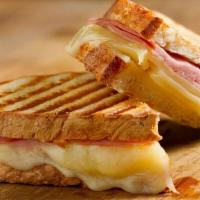 Sandwich Bread with Melted Cheese and Ham · Hot sandwich with cheese and ham