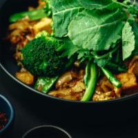 Pad See You · Chargrilled stir-fried flat rice noodles with egg and Asian broccoli.