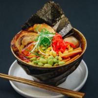 Spicy Miso Ramen · Home made, noodles, spicy miso broth chashu, egg, edamame, bamboo, pickled.