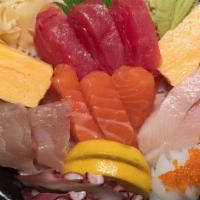 Chirashi · An assortment of sashimi over sushi rice.
served with salad & miso soup