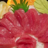 Tekka Donburi · Tuna sashimi over sushi rice.
served with salad & miso soup