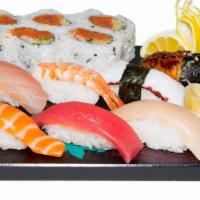 Deluxe Sushi Special · 6pcs Spicy tuna roll, 7pcs of nigiri (Tuna, salmon, hamachi, white tuna, tako, ebi. unagi)