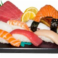 Golden Nigiri & Sashimi Combo · Each 4pcs of tuna, salmon sashimi, 7pcs of nigiri (tuna, salmon, hamachi, ebi, ika, tako, un...