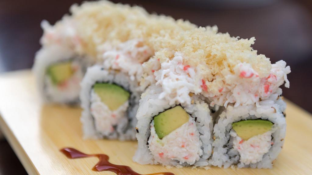 Deluxe California · CA roll topped with crab, crunchy and unagi sauce