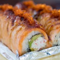 Lion King · Baked CA roll topped w/ salmon, tobiko & unagi sauce