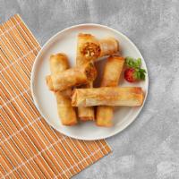 Steal My Spring Roll · Fried spring rolls made with chicken, black mushrooms, carrot, and glass noodles and served ...