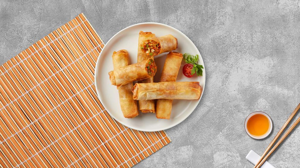Steal My Spring Roll · Fried spring rolls made with chicken, black mushrooms, carrot, and glass noodles and served with fish sauce.