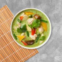Green Screen Curry · Green curry with eggplant, green peas, bell peppers, and basil cooked in coconut milk.