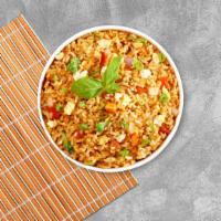 Upper East Fried Rice · Fried rice with green peas, carrots, onions, and egg.