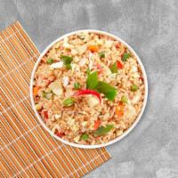 Battle Of The Basil Fried Rice · Spicy fried rice Thai style with egg, onions, bell peppers, fresh chili, garlic, and Thai ba...