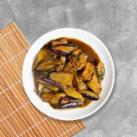 The Purple Tofu Anatomy · Sautéed tofu with eggplant in mild garlic sauce, onion, bell peppers, and fresh basil.