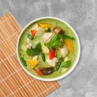 Curry Tofu With You · Green curry with tofu, eggplant green peas, bell peppers, and Thai basil cooked in coconut m...