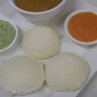 Idly · Gluten free, vegan. Steamed rice& lentil patties served with sambar & chutneys.