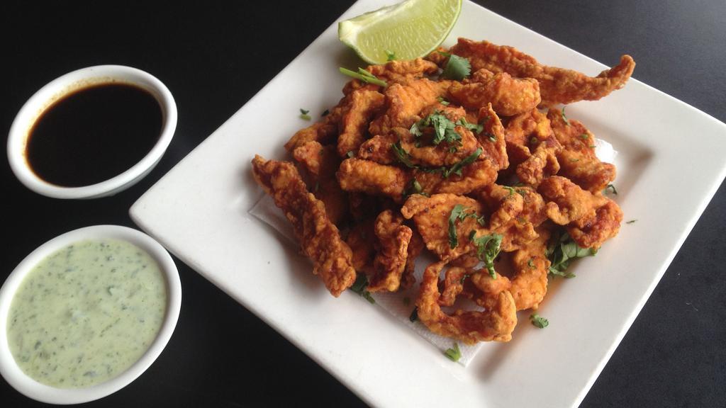 Chicken Pakora · Boneless chicken dipped in chick pea batter and fried.