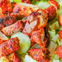 Tandoori Appetizers · Gluten free. Seek kabab, chicken tikka & boti kabab on a bed of greens.