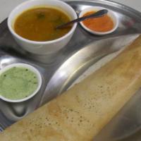 Masala Dosa · Gluten-free. Vegan. Thin crepe filled with spiced potatoes and onions.