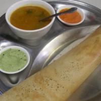 Paper Masala Dosa · Gluten-free. Vegan. Paper dosa filled with spiced potatoes and onions.