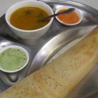 Egg Masala Dosa · Gluten-free. Vegan. Egg dosa filled with spiced potatoes and onions.