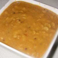 Dal · Vegan. Traditional yellow lentils flavored with spices.