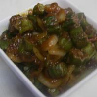 Bhindi Masala · Vegan. Stir fried fresh okra sautéed with onion, garlic & spices.