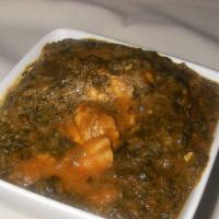 Chicken Palak · Chicken cooked in a spiced spinach puree.