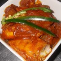 Fish Masala · Fish of the day cooked in a light curry sauce.