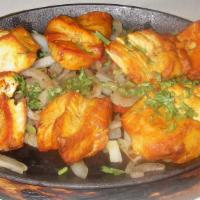 Chicken Tikka Kabab · Boneless chicken breast marinated in lemon and spices.