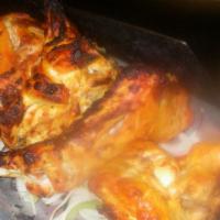 Full Tandoori Chicken · Chicken marinated in yogurt; cooked in clay oven.