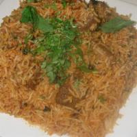 Vegetable Biryani · Rice with mixed vegetables in herb & spices.