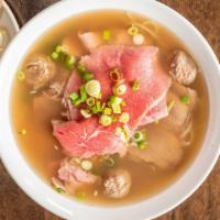 1. Perilla Beef Combo Pho · 160661386 favorite: Rare beef, well-done brisket and meatball noodle soup. Served with sprou...